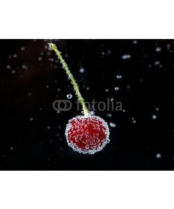 Africa Studio, Beautiful cherry in water with bubbles, on black background