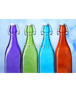 Africa Studio, Colorful bottles on light background