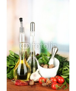 Africa Studio, Composition of mortar, bottles with olive oil and vinegar, and
