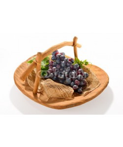 amenic181, Grapes in wooden basket isolated on white