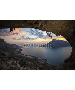 Andrey Bandurenko, Male rock climber at sunset. Kalymnos Island, Greece