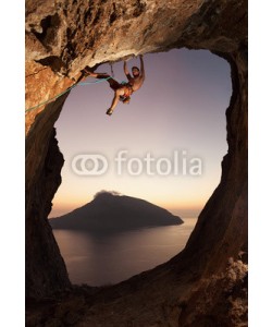 Andrey Bandurenko, Rock climber at sunset. Kalymnos Island, Greece.