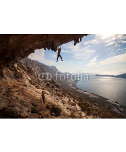 Andrey Bandurenko, Rock climber climbing at the rock , Kalymnos Island, Greece