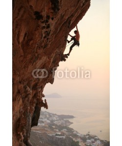 Andrey Bandurenko, Rock climber at sunset, Kalymnos Island, Greece