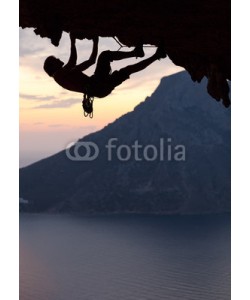 Andrey Bandurenko, Silhouette of a rock climber at sunset. Kalymnos Island, Greece.