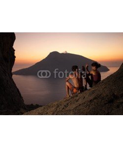 Andrey Bandurenko, Two rock climbers giving high five and cheering