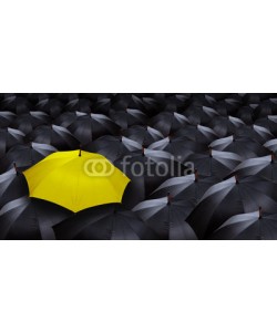 chones, many blacks umbrellas and one yellow umbrella