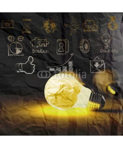 everythingpossible, light bulb 3d on business strategy on crumpled paper background