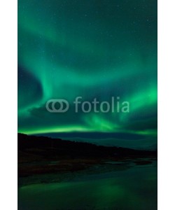 jamenpercy, Northern lights above lagoon in Iceland