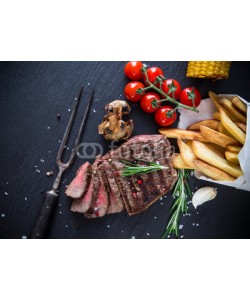 Kesu, Beef steak on stone background