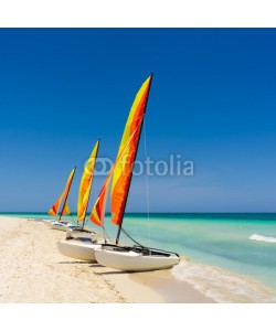 kmiragaya, Colorful sailing boats on a cuban beach