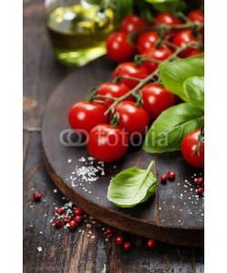 Natalia Klenova, Tomatoes with basil on wooden table background