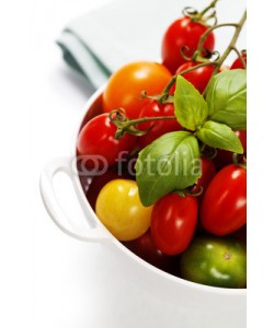 Natalia Klenova, Assorted tomatoes and vegetables in colander