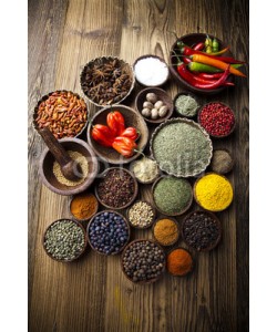 Sebastian Duda, Assortment of spices in wooden bowl background