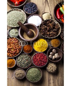 Sebastian Duda, Assortment of spices in wooden bowl background