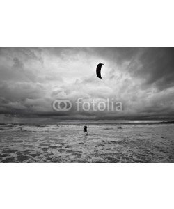 Zai Aragon, Kitesurfer gets in the water during a storm.