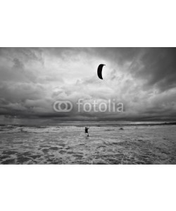 Zai Aragon, Kitesurfer gets in the water during a storm.