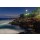 Viktar, Colorful sunset at the Kovalam beach, Kerala, India. Lighthouse view. Long exposure.