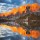 Viktar, Evening on Laghi dei Piani (Lakes Piano) with mountains in sunlit reflected in smooth surface lake water, Southern Tyrol, Dolomites, Tre Cime di Lavaredo National Park, Italy. Enrosadira.