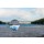 bychykhin, Glass transparent ball on bridge background and grainy surface