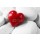 Africa Studio, Red heard over pebbles background